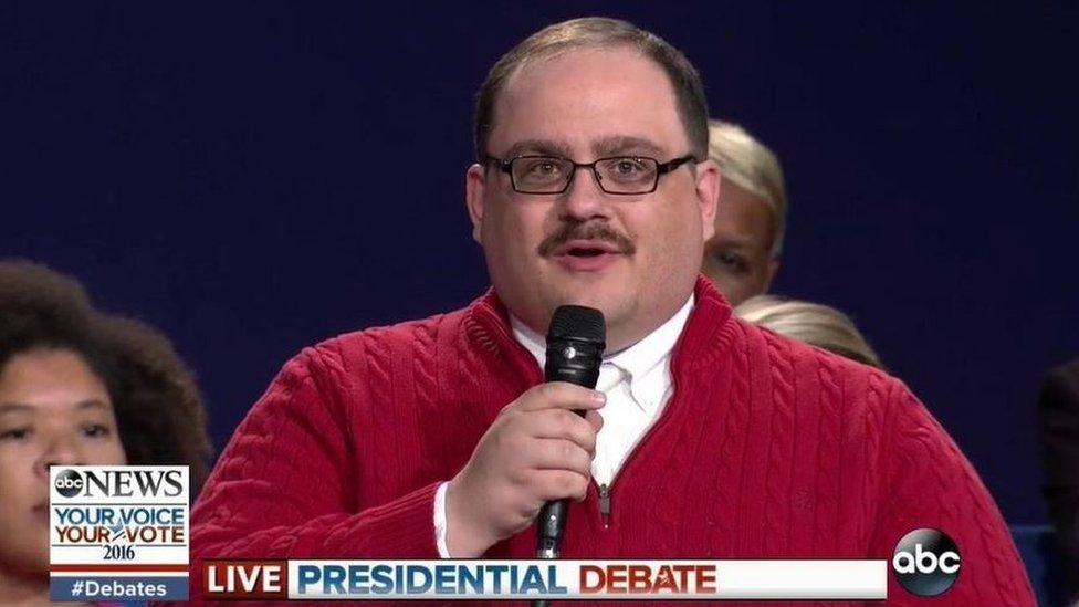 This is a photo of Ken Bone asking a question during