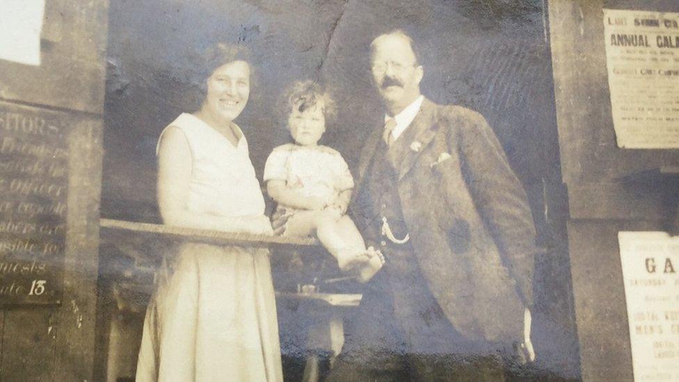 A young Janet Cocks with her parents