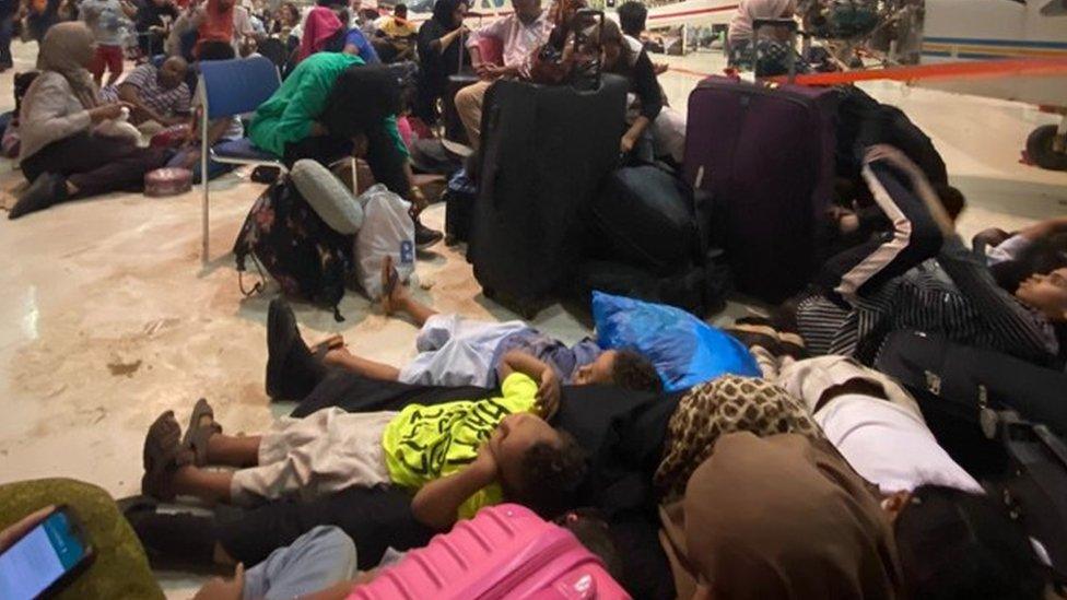 Wafaa Salim and her nieces and nephews waiting in the air base