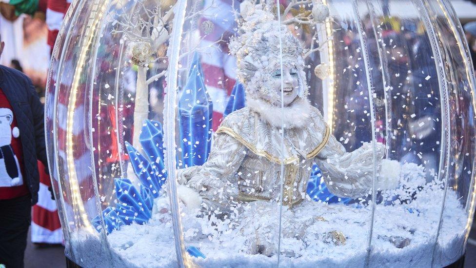 woman in snow globe