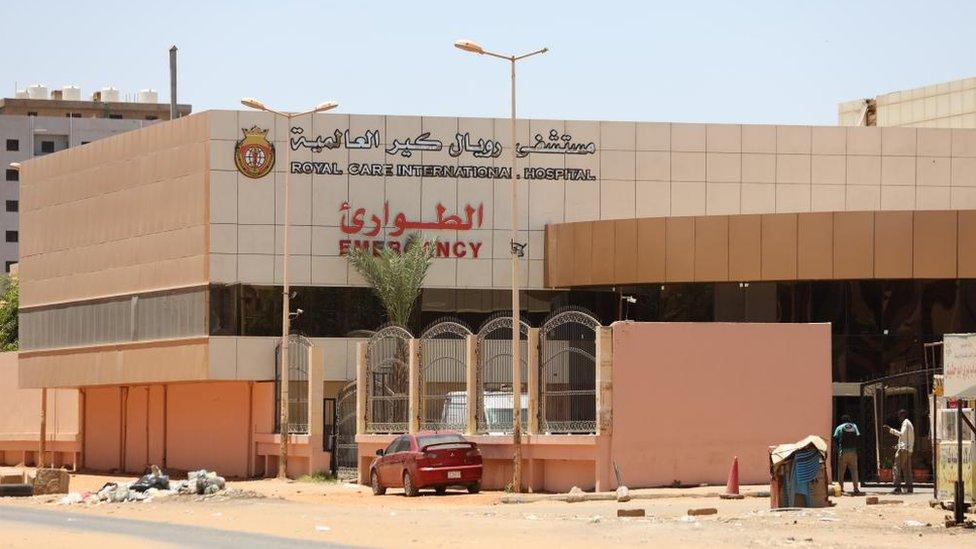 People standing outside Khartoum hospital