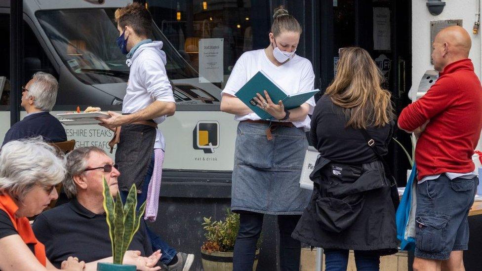 people outside restaurant