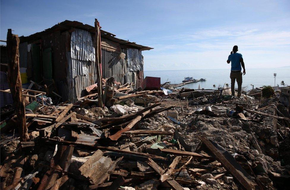 Haitians affected by Hurricane Matthew rebuild their houses in Jeremie, Haiti, on 11 October, 2016.