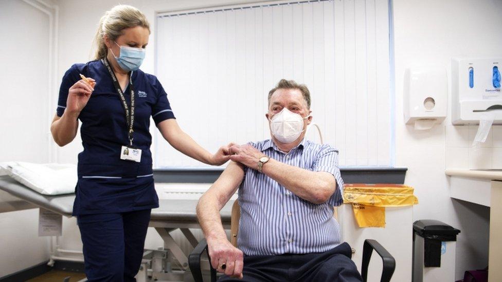 man-getting-vaccine.