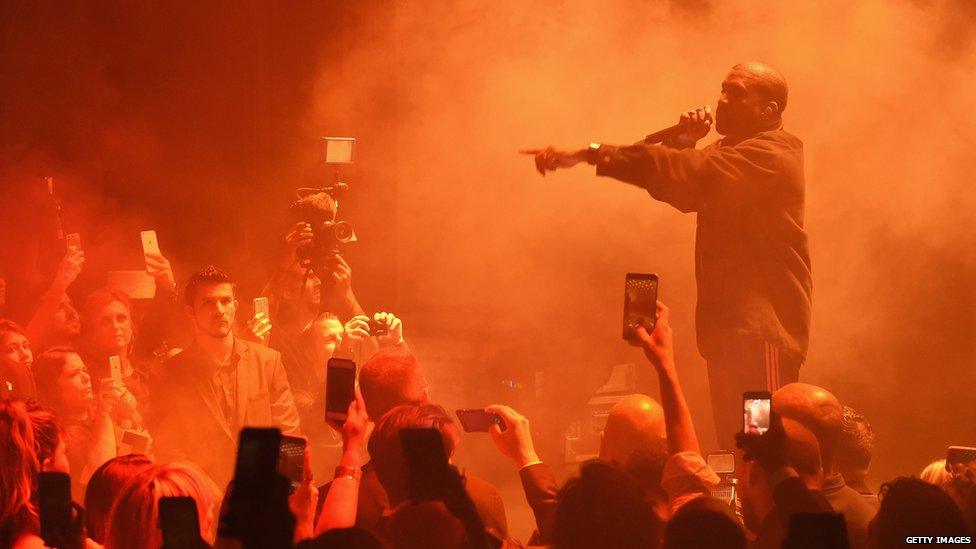 Kanye West performing