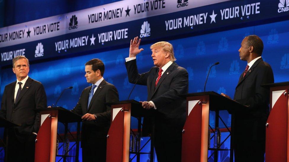 Presidential candidates Donald Trump speaks while Sen. Marco Rubio (R-FL), Jeb Bush, and Ben Carson look on during the CNBC Republican Presidential Debate at University of Colorados Coors Events Center October 28, 2015 in Boulder, Colorado