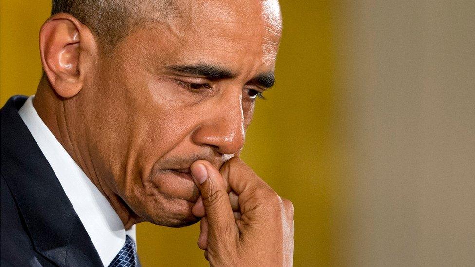 An emotional President Barack Obama pauses as he speaks about the youngest victims of the Sandy Hook shootings, Tuesday, Jan. 5, 2016, in the East Room of the White House in Washington