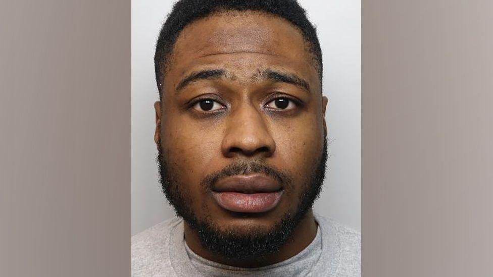 Police custody mugshot of Junior Emmanuel Uwadia