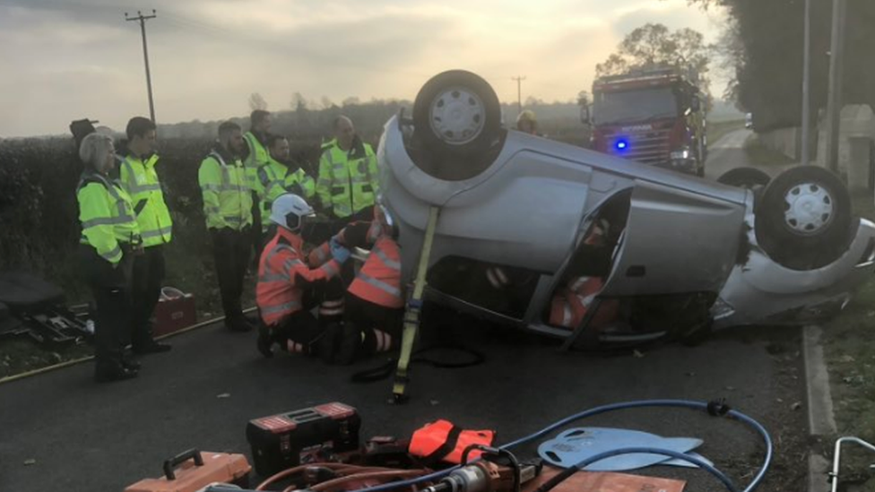 Car upside down after crash in Marholm