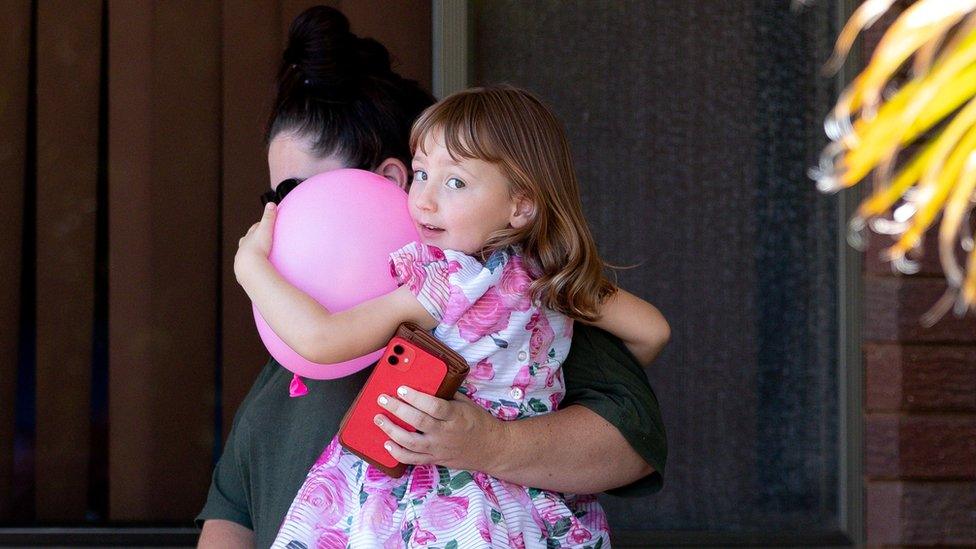 Cleo Smith and her mother Ellie Smith leave a house where the girl spent her first night after being rescued in Carnarvon, Australia, November 4, 2021.