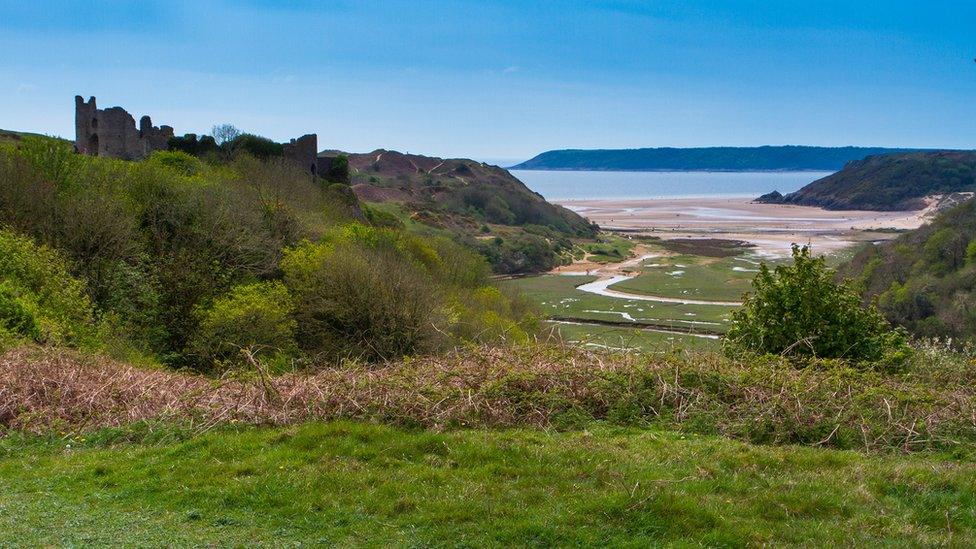 Pennard Castle overlooking Three Cliffs Bay on Gower, near Swansea, by John Minipoli.