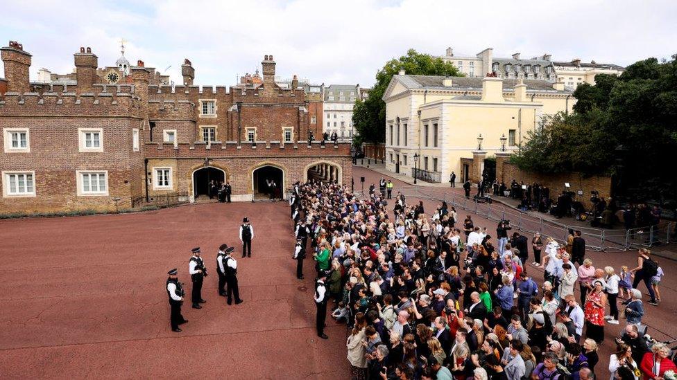 Crowds waiting outside