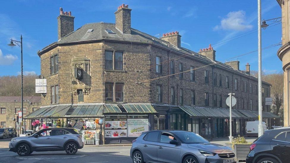 Street view image of Waterfoot showing the Trickett's Arcade building