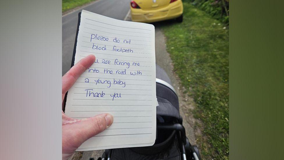 A buggy, a notepad and a car