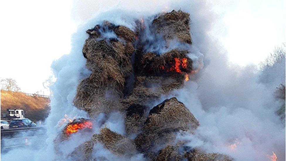 Hay bales on fire