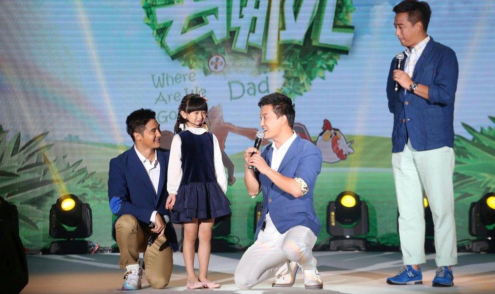 Tian Liang and his daughter Cindy being interviewed at a promotional event for Dad, Where Are We Going