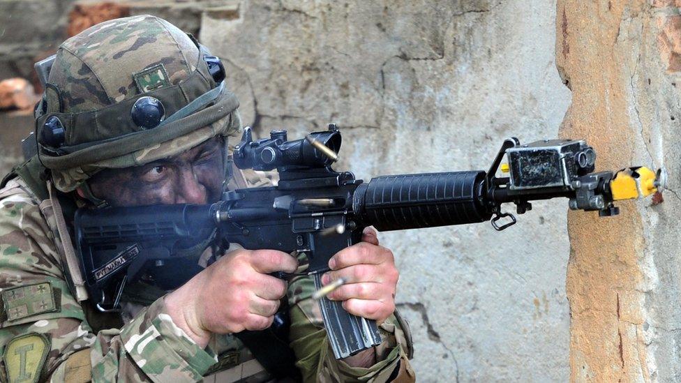 Georgian soldier using the M4 assault rifle