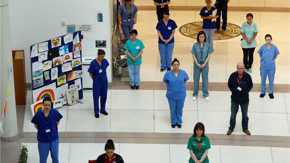 NHS staff observe a minute's silence in honour of key workers who have lost their lives due to COVID-19 at Mater Infirmorum Hospital, following the outbreak of the coronavirus disease (COVID-19), Belfast, Northern Ireland