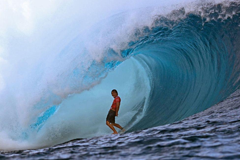 USA's surfer Barron Mamiya competes in the men's Shiseido Tahiti Pro surfing competition elimination round, in Teahupo'o, on the French Polynesian Island of Tahiti, on 29 May 2024.