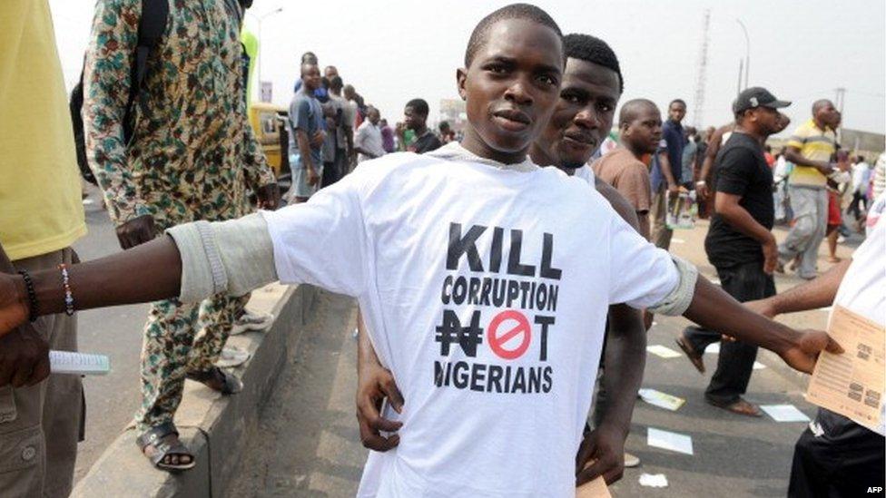 A protestor sports a an anti-corruption T-shirt on January 9, 2012 in Lagos during a demonstration against the more than doubling of petrol prices after government abolished fuel subsidies