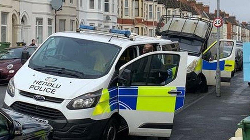 South Wales Police raid a home in Cardiff