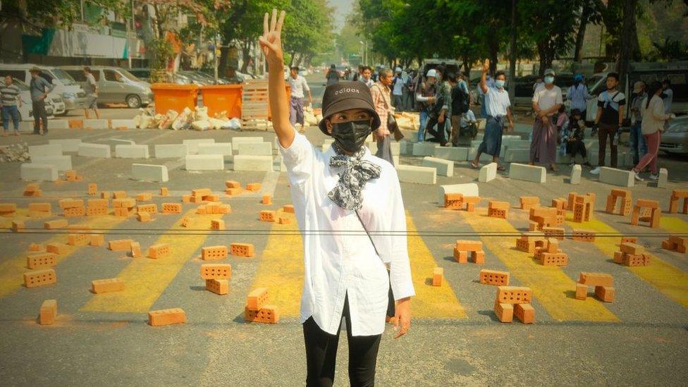 People gather to protest against the military coup in Yangon