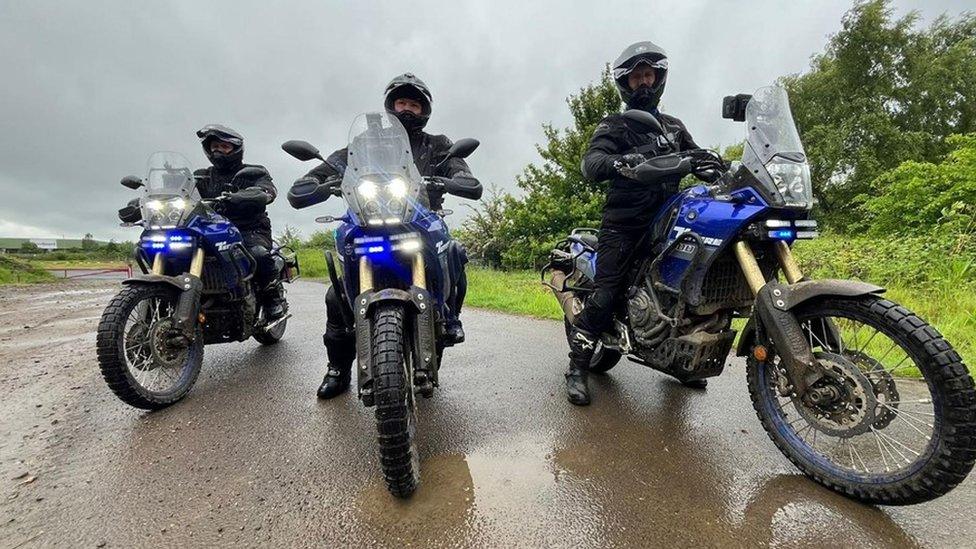 Police officers on motorbikes