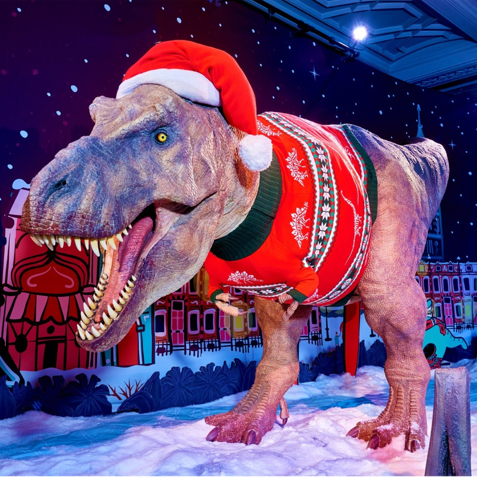 Picture of the day: Christmas and dinosaurs go together like cheese and biscuits, so what better way for the Natural History Museum to begin its festive celebrations than dressing one of its T-Rex models in a Christmas jumper and hat