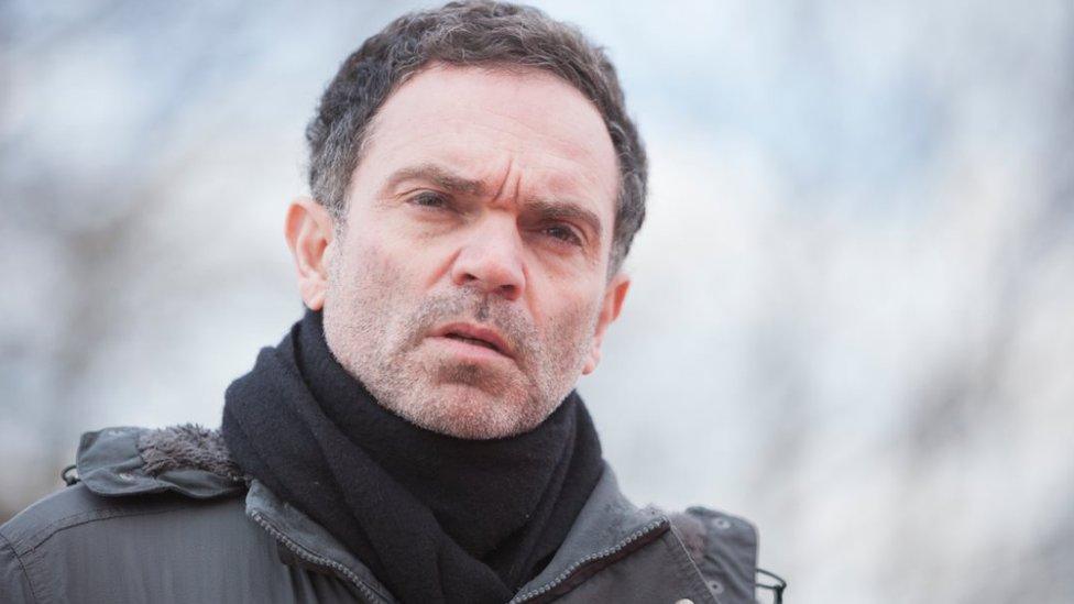 Yann Moix in outside shot