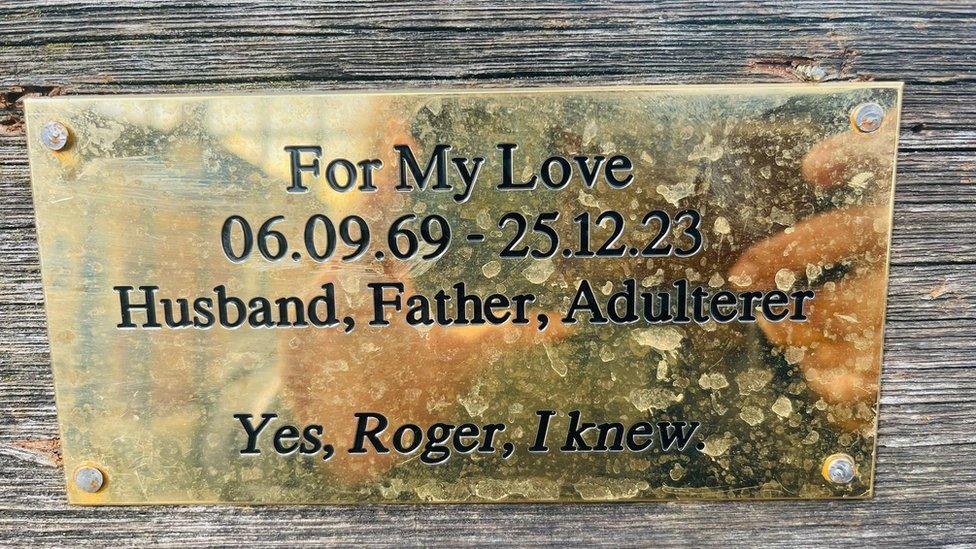 A plaque on a bench saying someone "knew" a man called Roger was an adulterer