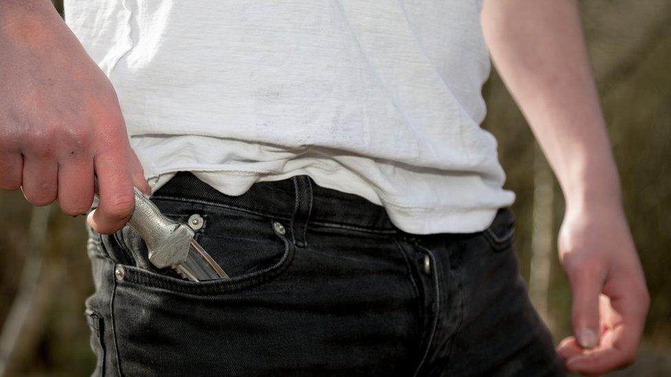 Teenager carrying a knife