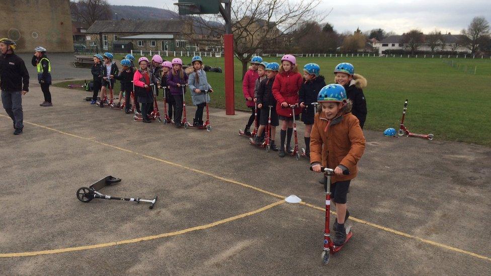 Scooters being used by school children