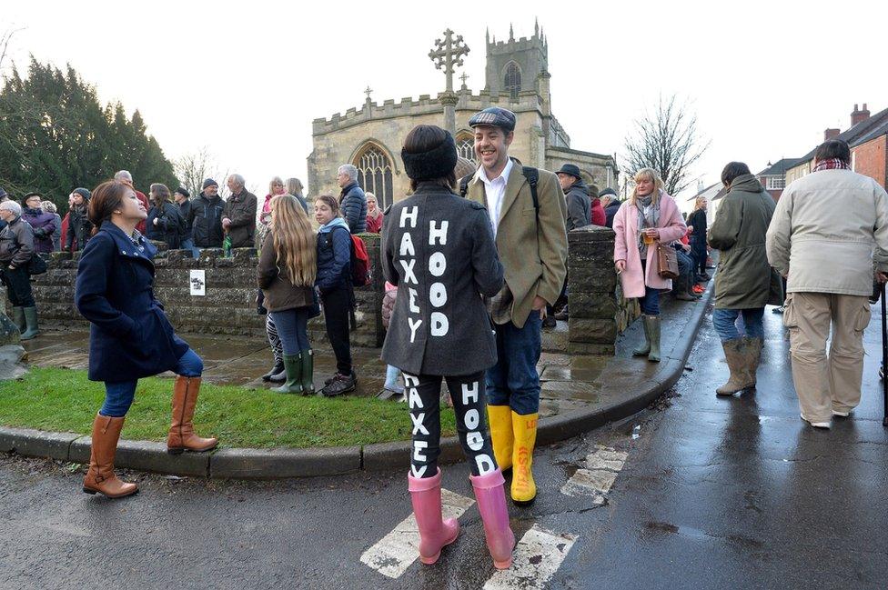 People wait outside the church before the 2016 Haxey Hood