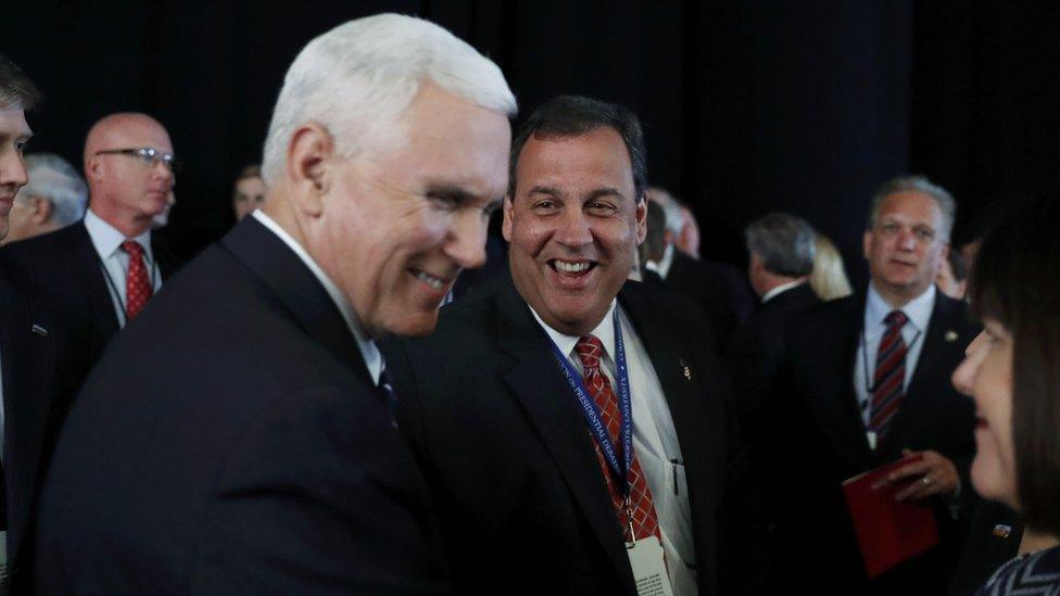 Vice-President-Elect Mike Pence greets New Jersey Governor Chris Christie.