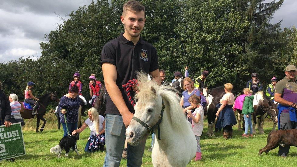 A man with a pony