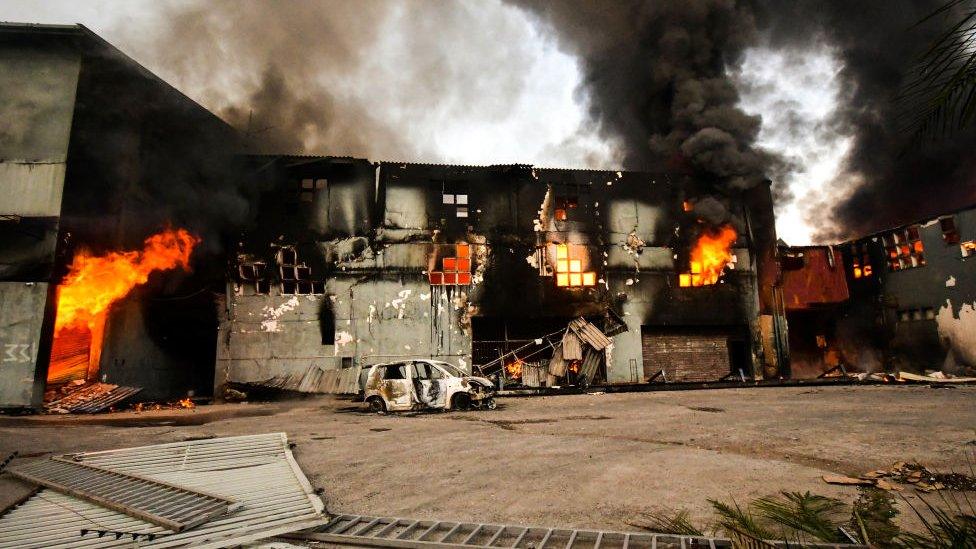 Burning factory in Sea Cow Lake area on July 12, 2021 in Durban, South Africa.