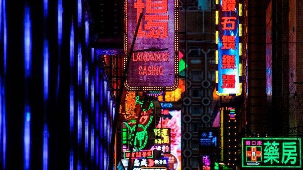 Neon signage for the Landmark Casino is seen in Macau.