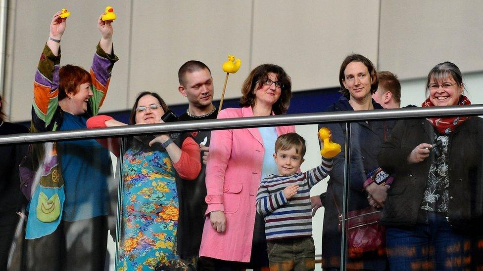 Pro-duckists with rubber ducks at the unveiling of the Sir Nigel Gresley statue