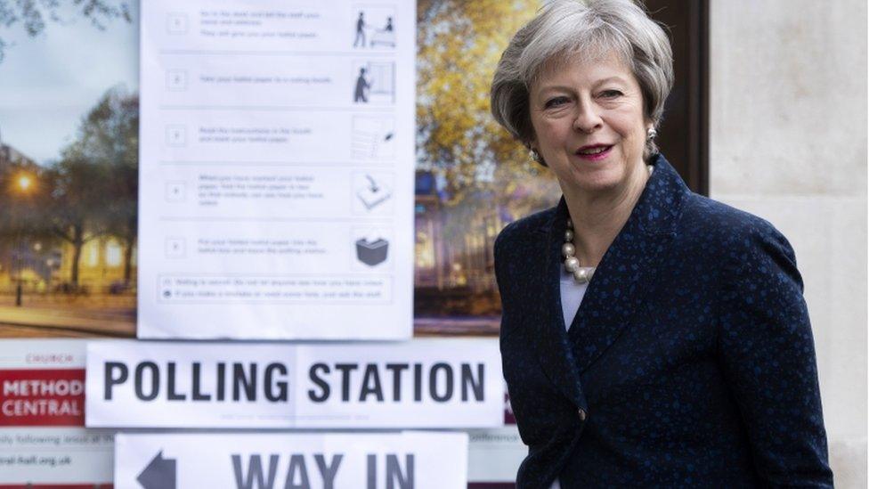 Theresa May outside polling station