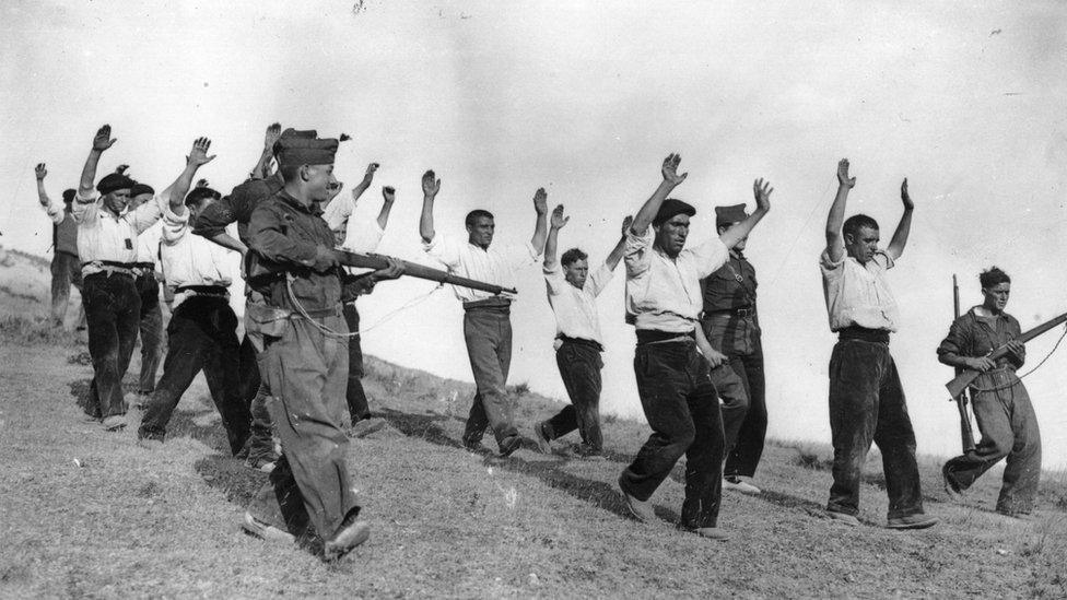 Nationalist troops capture Republicans during the Spanish Civil War