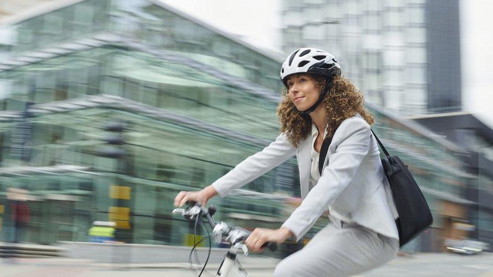 Women cyclist commuter- stock shot