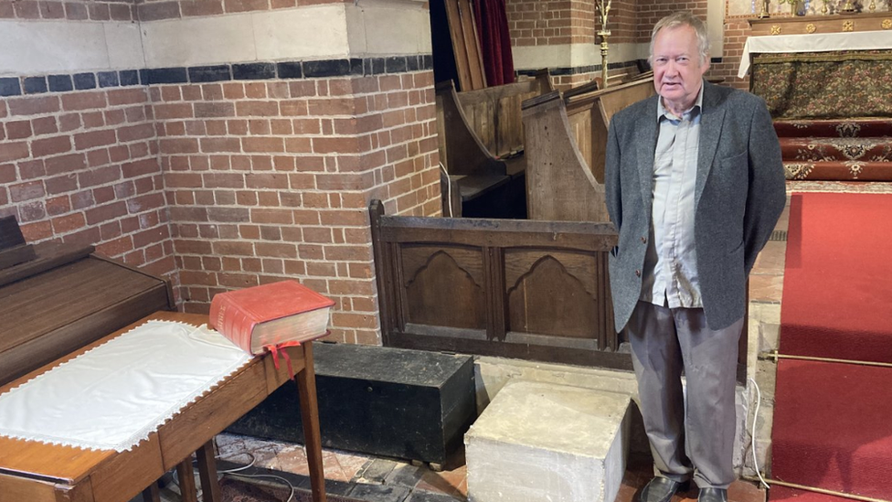 Simon Thompson at lectern plinth