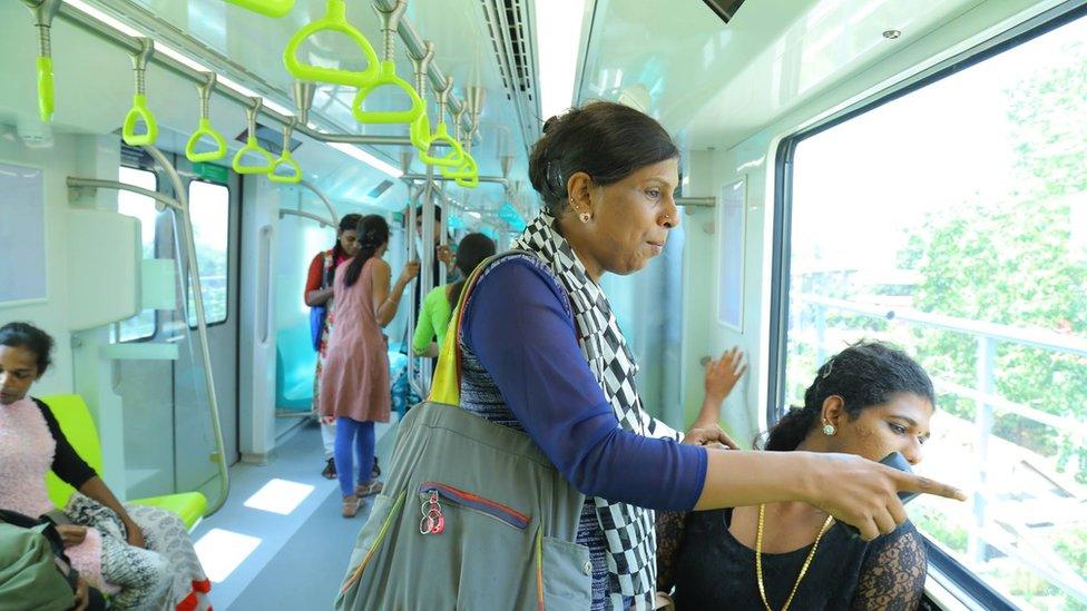 Transgender employees inside one of the new coaches of the Cochin metro