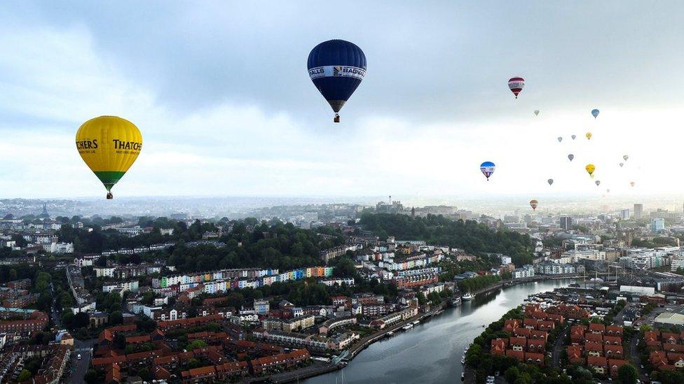 Balloons over a Bristol river