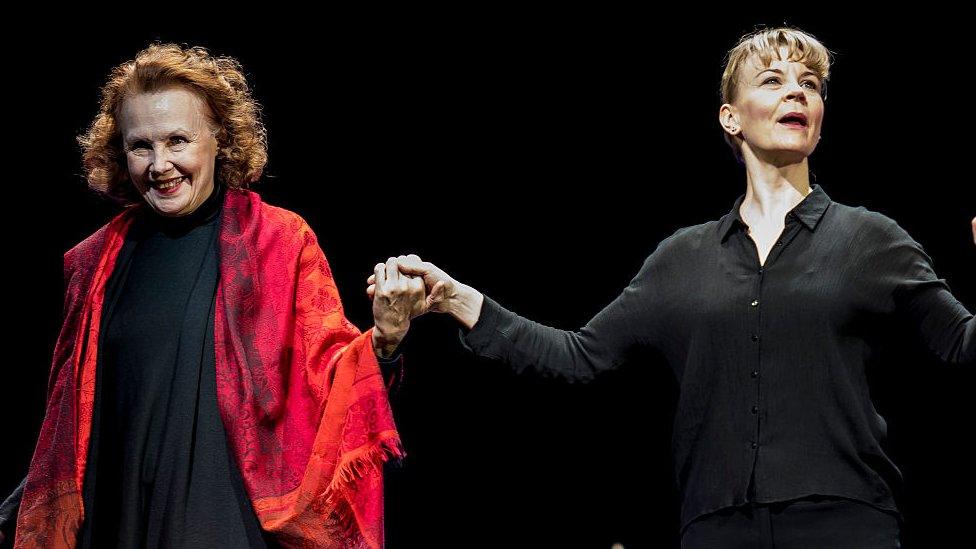 Finnish composer Kaija Saariaho (left) and conductor Susanna Malkki take a bow after the final dress rehearsal prior to the premiere of Robert Lepage's production of 'L'Amour de loin' ('Love from Afar')