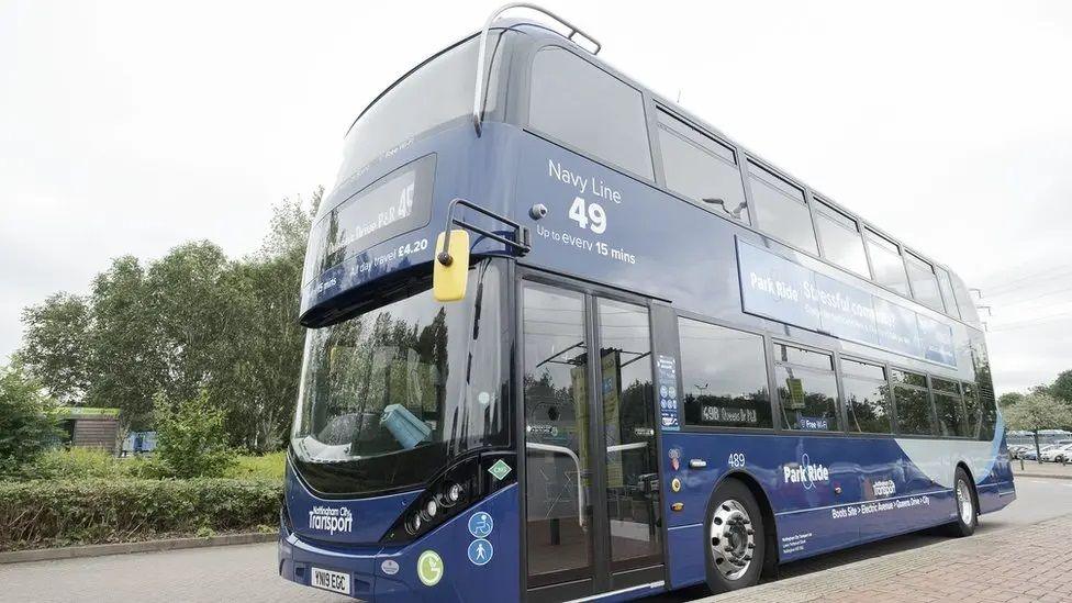 A double decker Navy line NCT bus