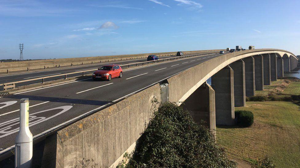 A drone image of the A14 over Orwell Bridge. Vehicles are seen moving along the road in each direction.
