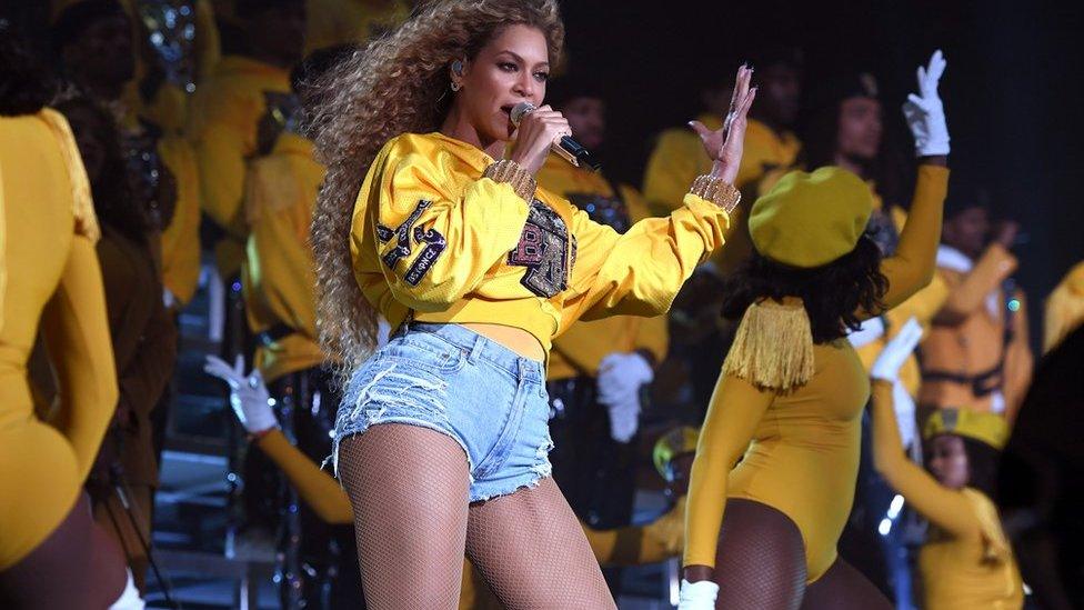 Beyonce and dancers on stage at Coachella