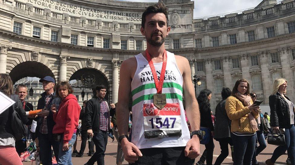 Matthew Rees with race finish medal in London