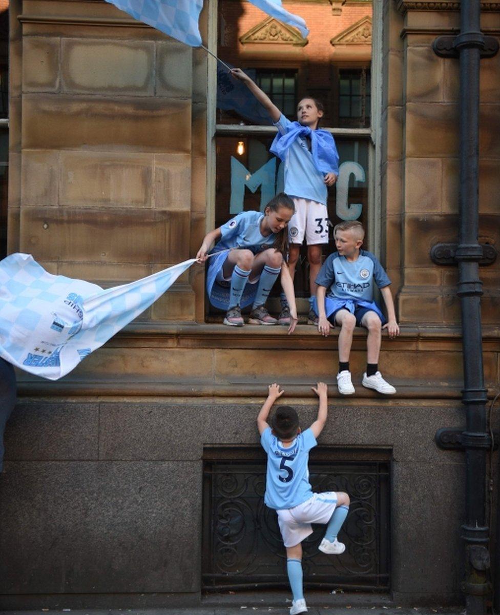 Children watching the parade